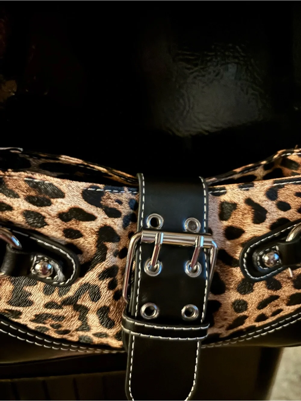 Leopard Print Shoulder Bag with Black Trim and Buckle Accent